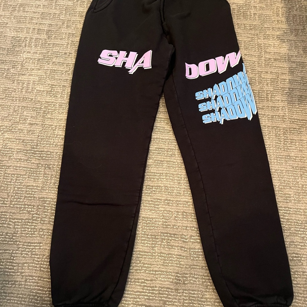 Shadow Hill Black Sweatpants with Vibrant Text